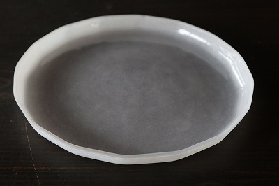 kom11